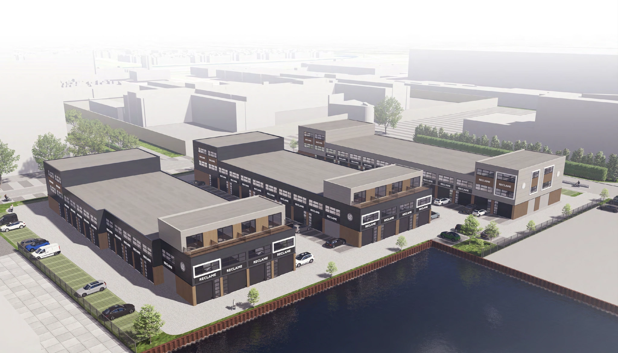 Luchtbeeld van het bedrijvenpark De Liesbosch met moderne bedrijfsunits langs een waterkant.